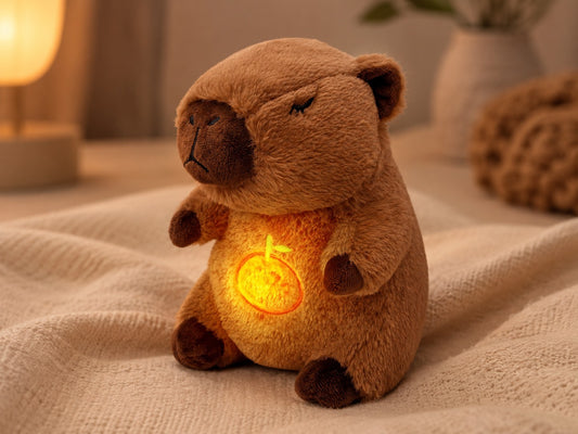 Sanki breathing capybara plush glowing on a cozy bed with a warm lamp