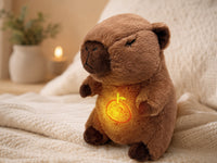 Sanki breathing capybara plush glowing next to a candle in a cozy bedroom